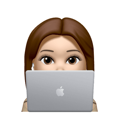 Person peeking from behind laptop